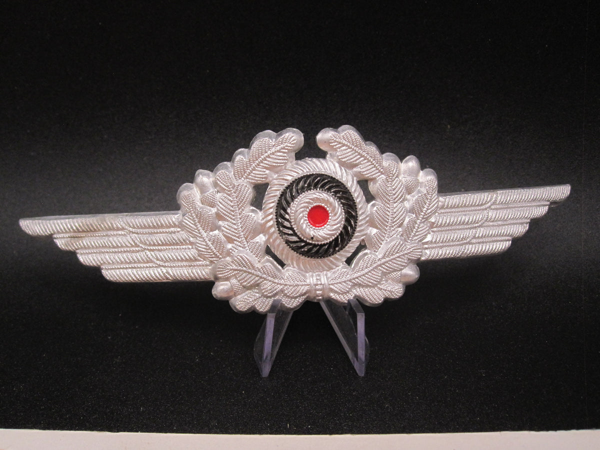 H.W. - - Mützenschwinge für die Schirmmütze der deutschen Luftwaffe