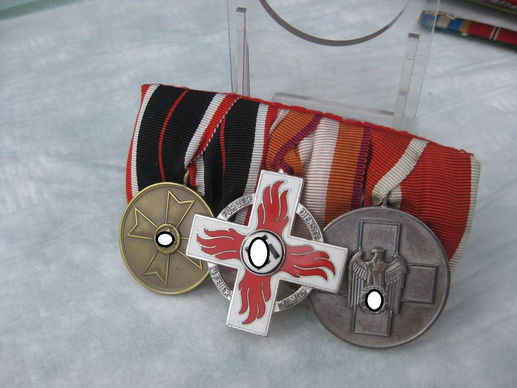 3er Ordensspange Kriegsverdienstmedaille 1939 Feuerwehr Ehrenzeichen 2.Stufe Volkspflegemedaille  3.Reich Feuerwehrorden Reichsfeuerwehrehrenzeichen