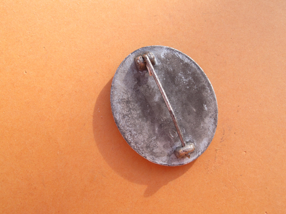 Verwundetenabzeichen 1939 in Silber Hersteller: "65"