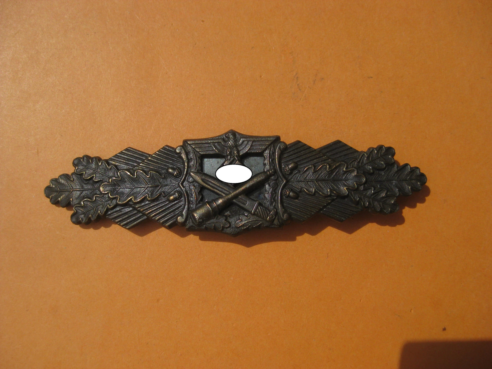 H.W.  - -    Nahkampfspange in Bronze Hersteller: JFS Mint Condition