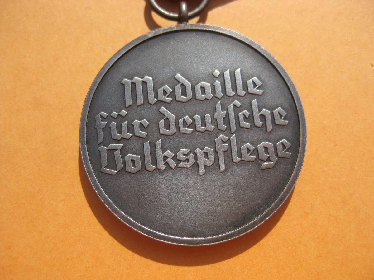 H.W.   Medaille für deutsche Volkspflege
