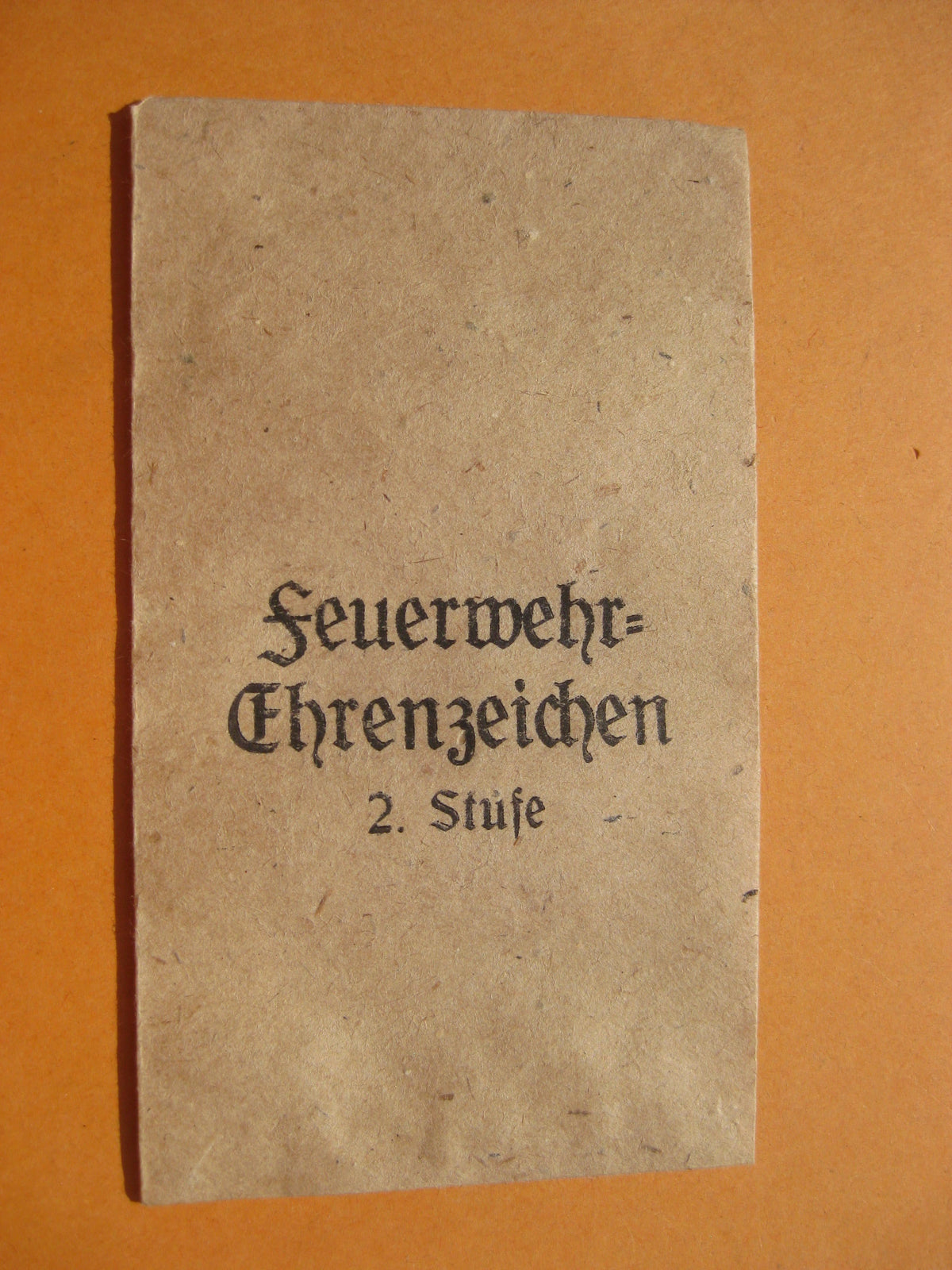 H.W.             Reichsfeuerwehr Ehrenzeichen 2.Klasse in Verleihungstüte