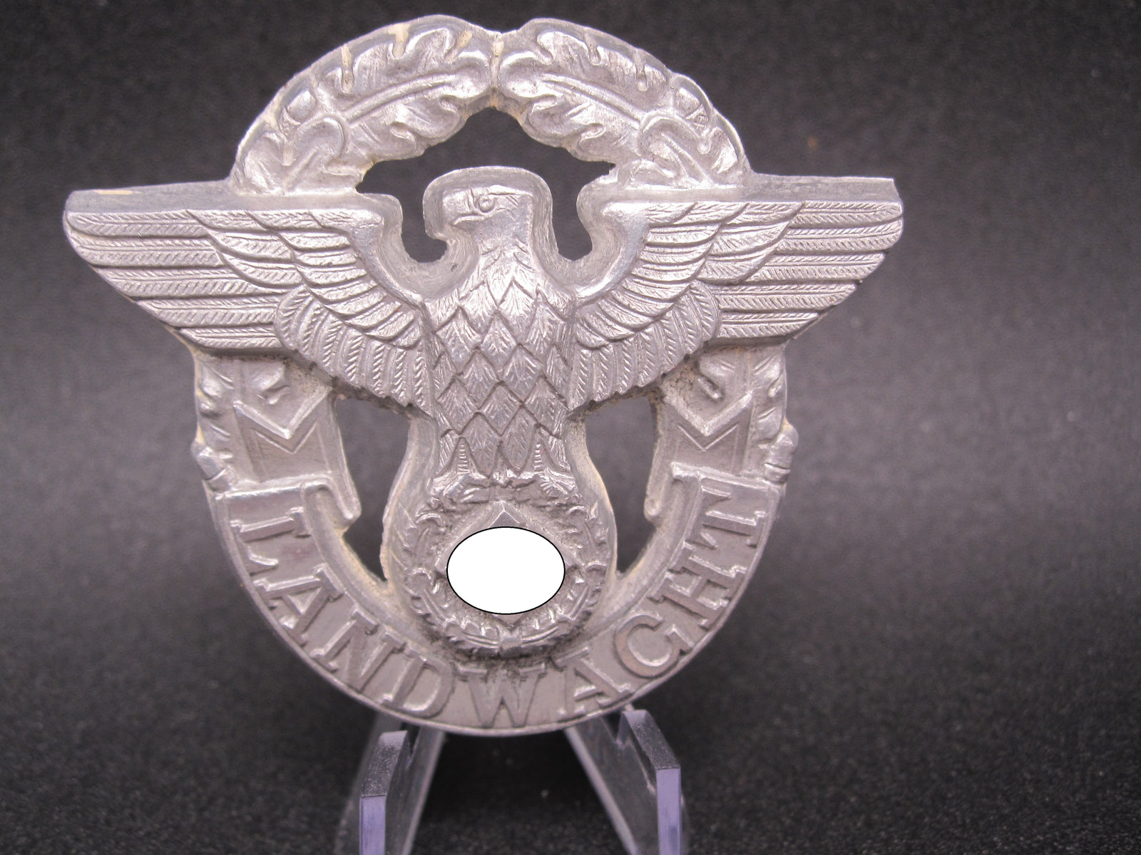 H.W.  -  -  Polizei - Landwacht Mützenabzeichen