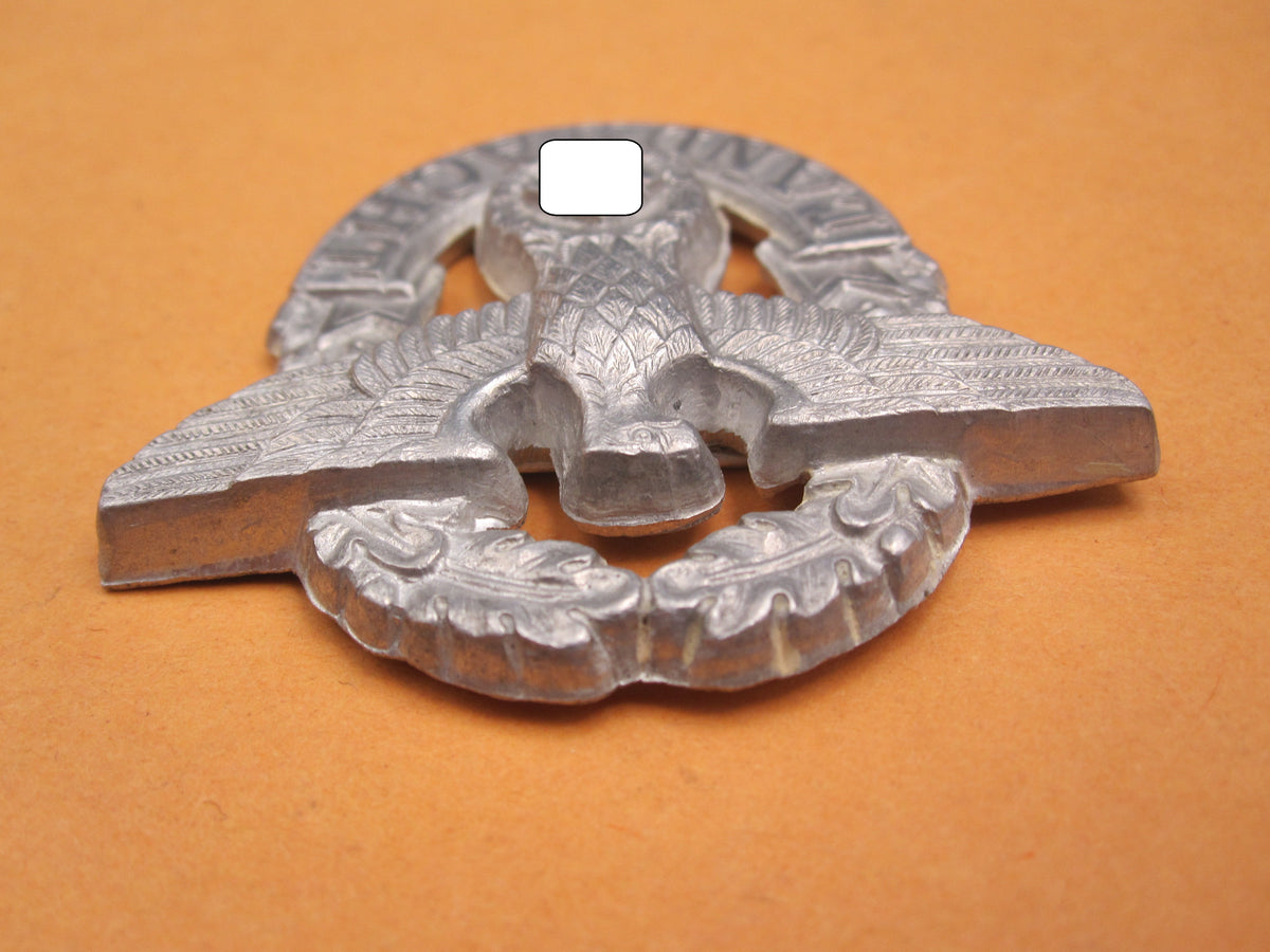 H.W.  -  -  Polizei - Landwacht Mützenabzeichen