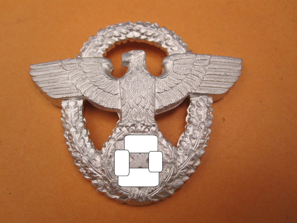 H.W.  -  -  Polizei / Feuerwehr Mützenabzeichen 2.Form