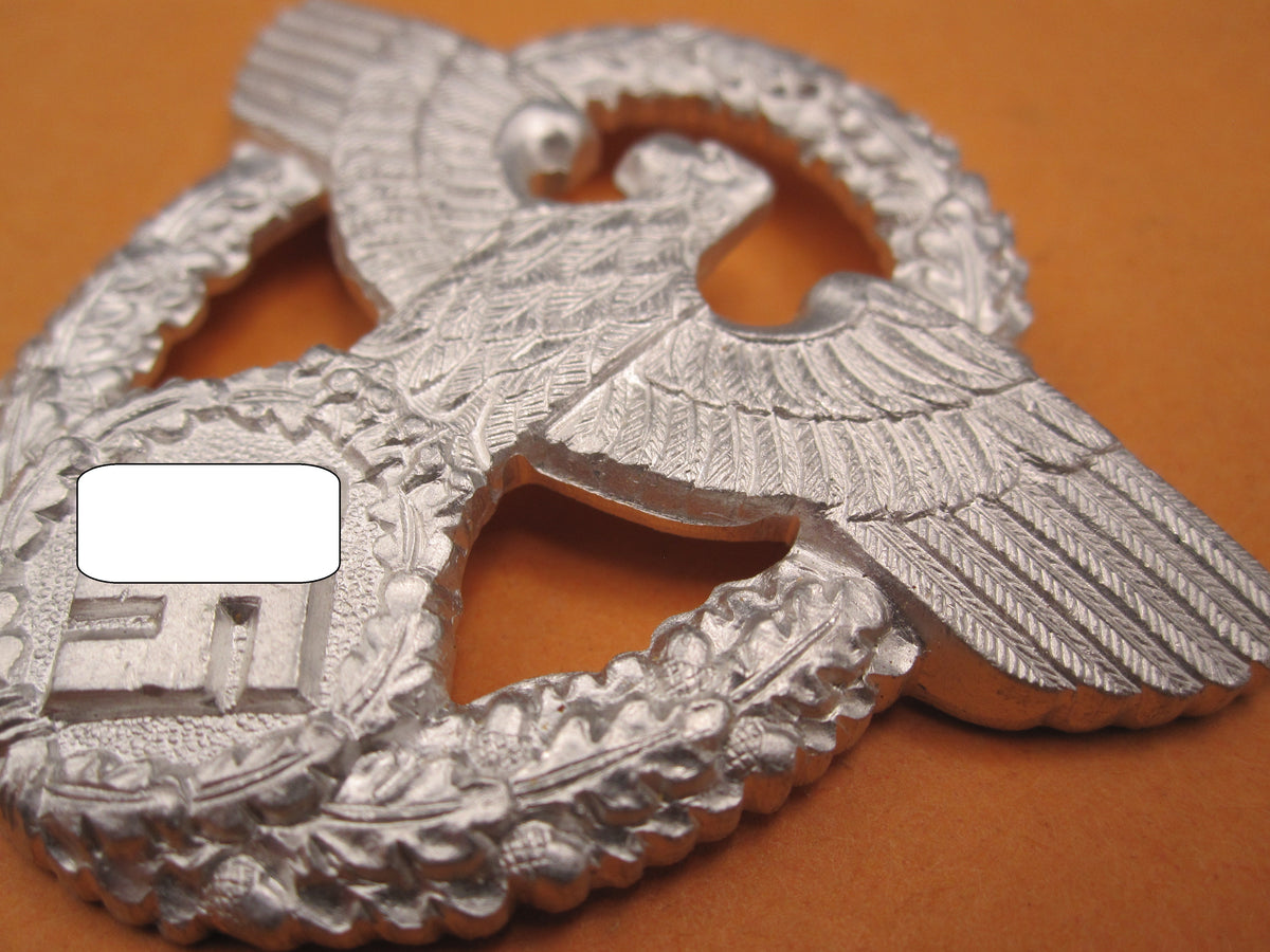H.W.  -  -  Polizei / Feuerwehr Mützenabzeichen 2.Form