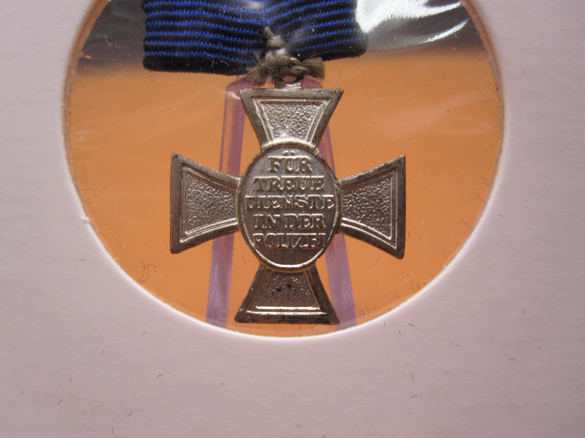 H.W.  -  - Miniatur Kreuz für 18 Dienstjahre in der deutschen Polizei