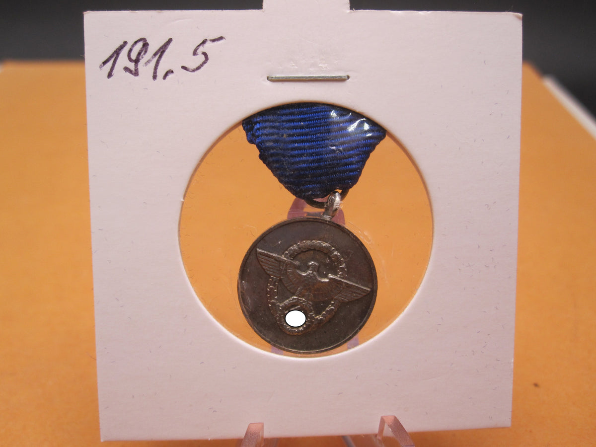 H.W.  -  - Miniatur Medaille für 8 Dienstjahre in der deutschen Polizei