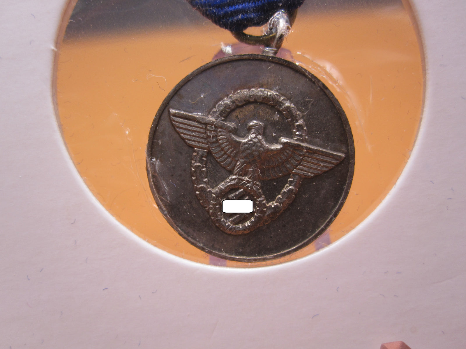 H.W.  -  - Miniatur Medaille für 8 Dienstjahre in der deutschen Polizei