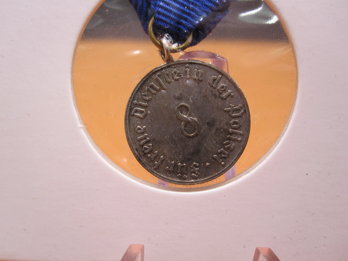 H.W.  -  - Miniatur Medaille für 8 Dienstjahre in der deutschen Polizei