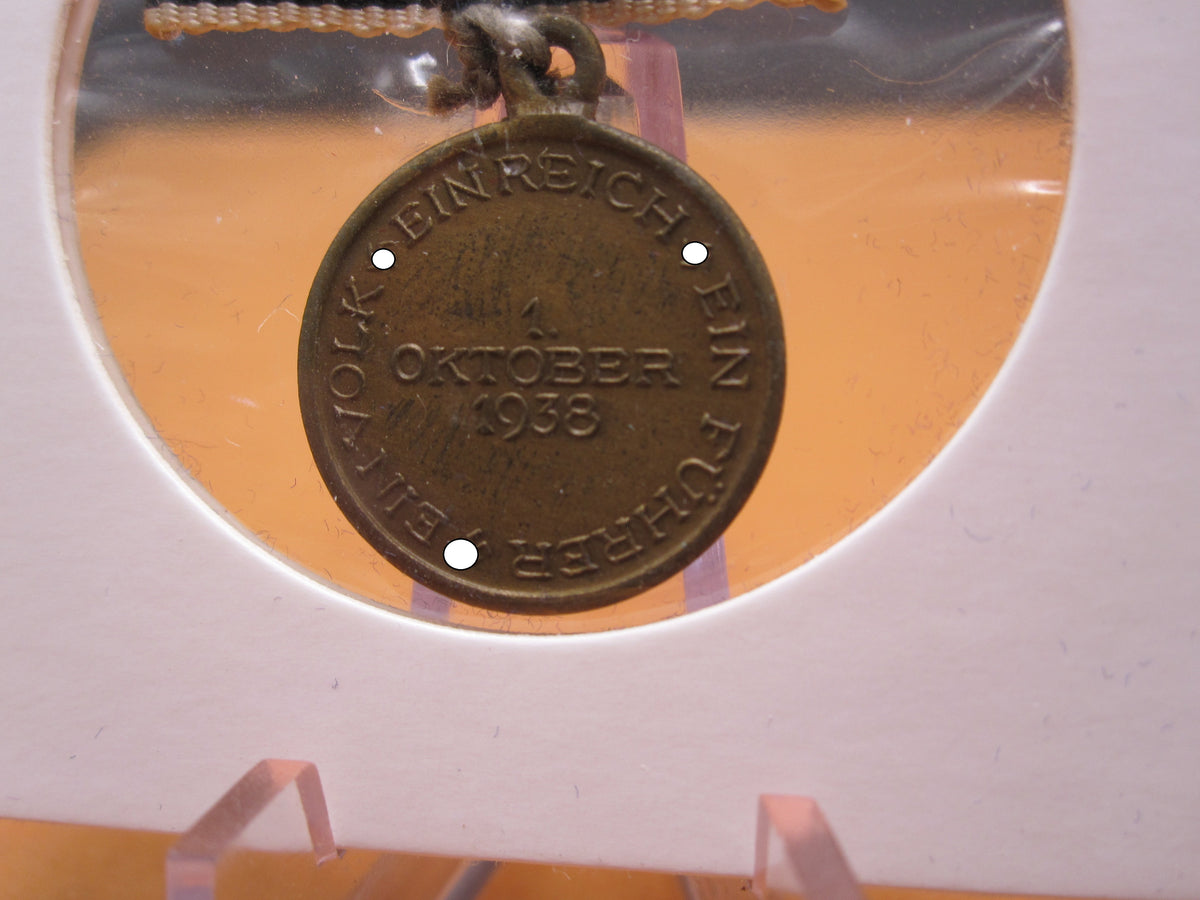 H.W.  -  - Miniatur Medaille zur Erinnerung an den 1. Oktober 1938 sog. Anschlussmedaille