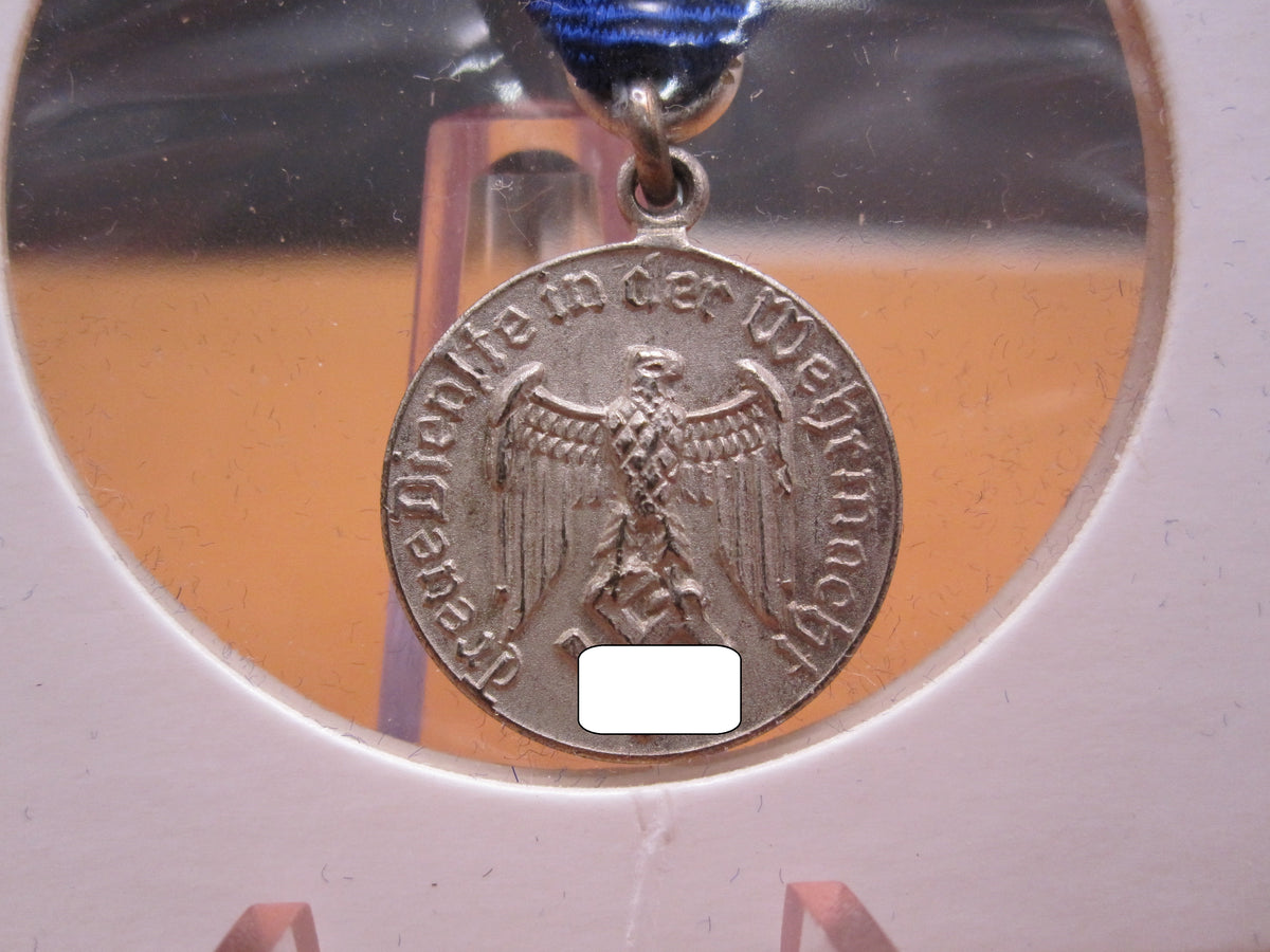 H.W.  -  - Miniatur Medaille für 4 Dienstjahre in der Wehrmacht