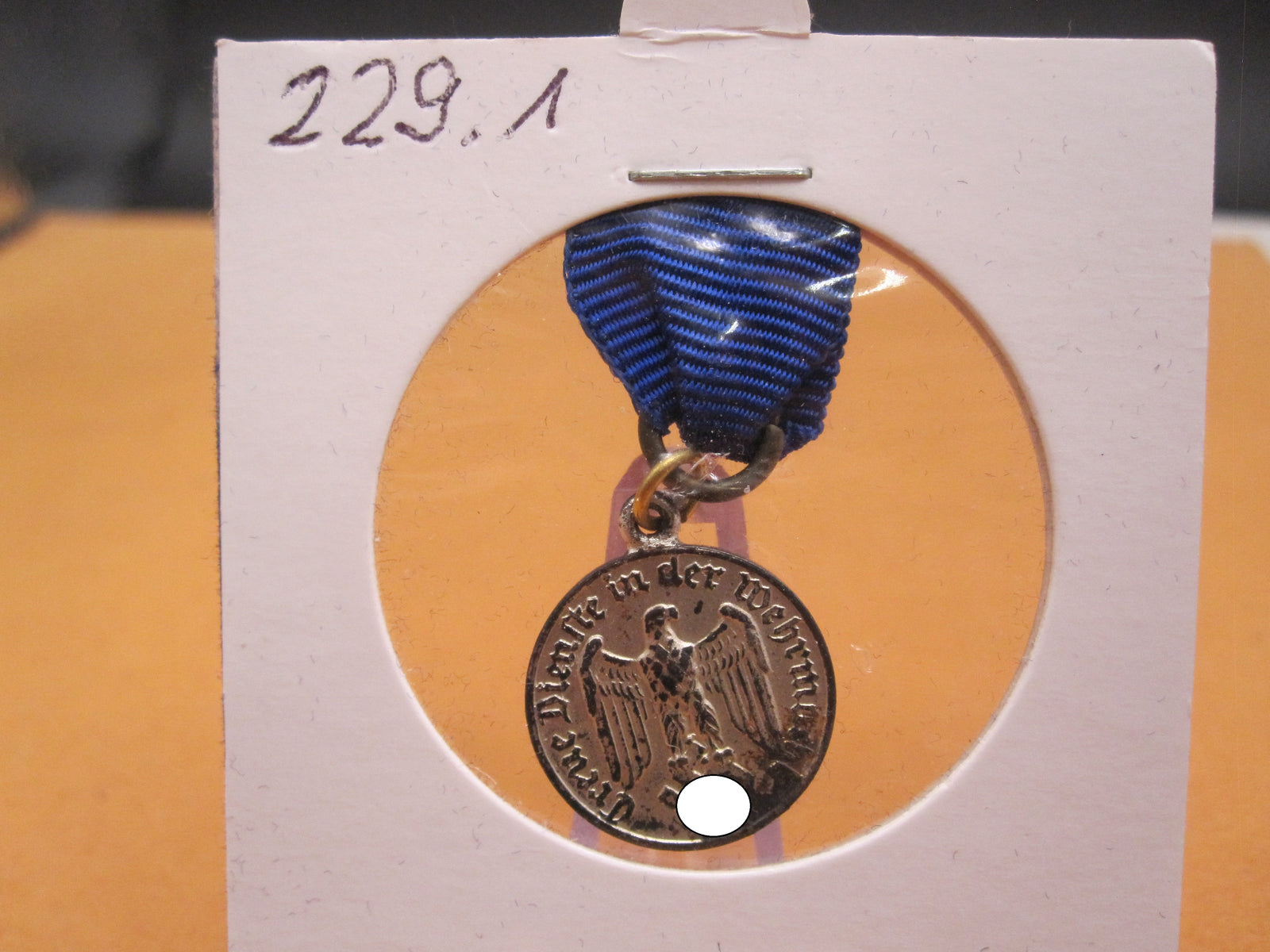 H.W.  -  - Miniatur Medaille für 4 Dienstjahre in der Wehrmacht
