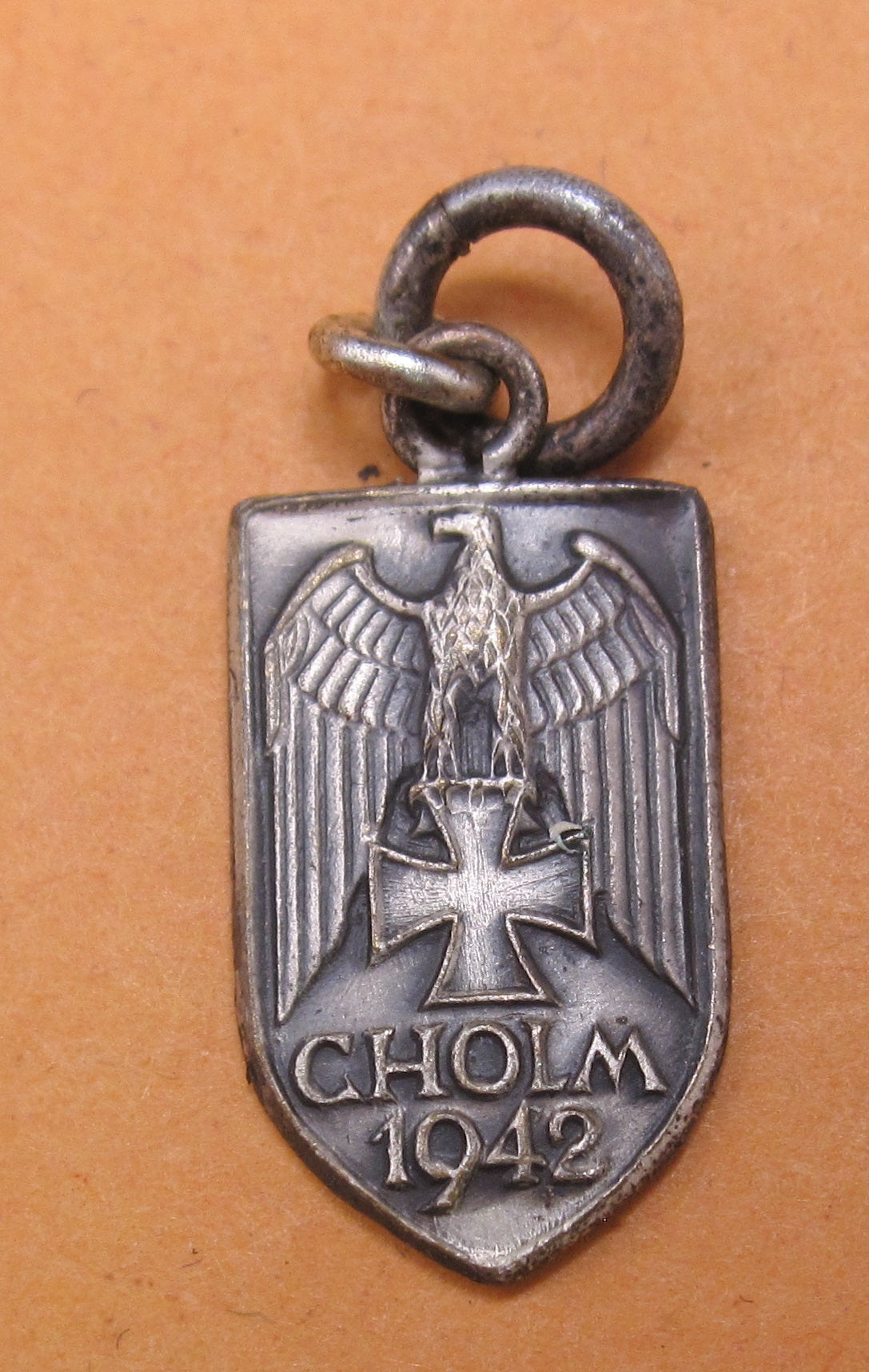 H.W.  -  - Miniatur Ärmelschild Cholmschild Modell 1957