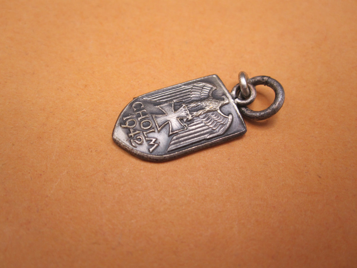 H.W.  -  - Miniatur Ärmelschild Cholmschild Modell 1957