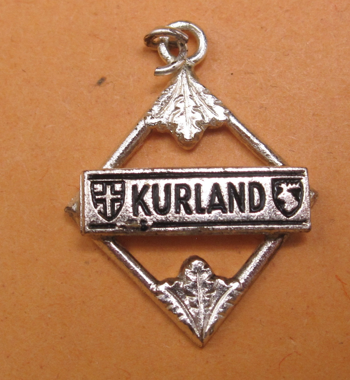 H.W.  -  - Miniatur Ärmelband KURLAND Modell / Ausführung 1957
