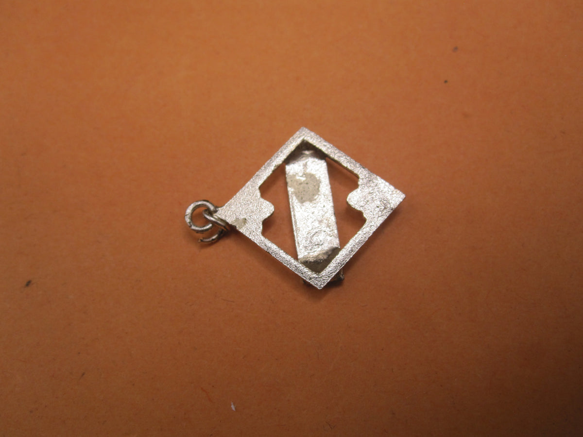 H.W.  -  - Miniatur Ärmelband KURLAND Modell / Ausführung 1957