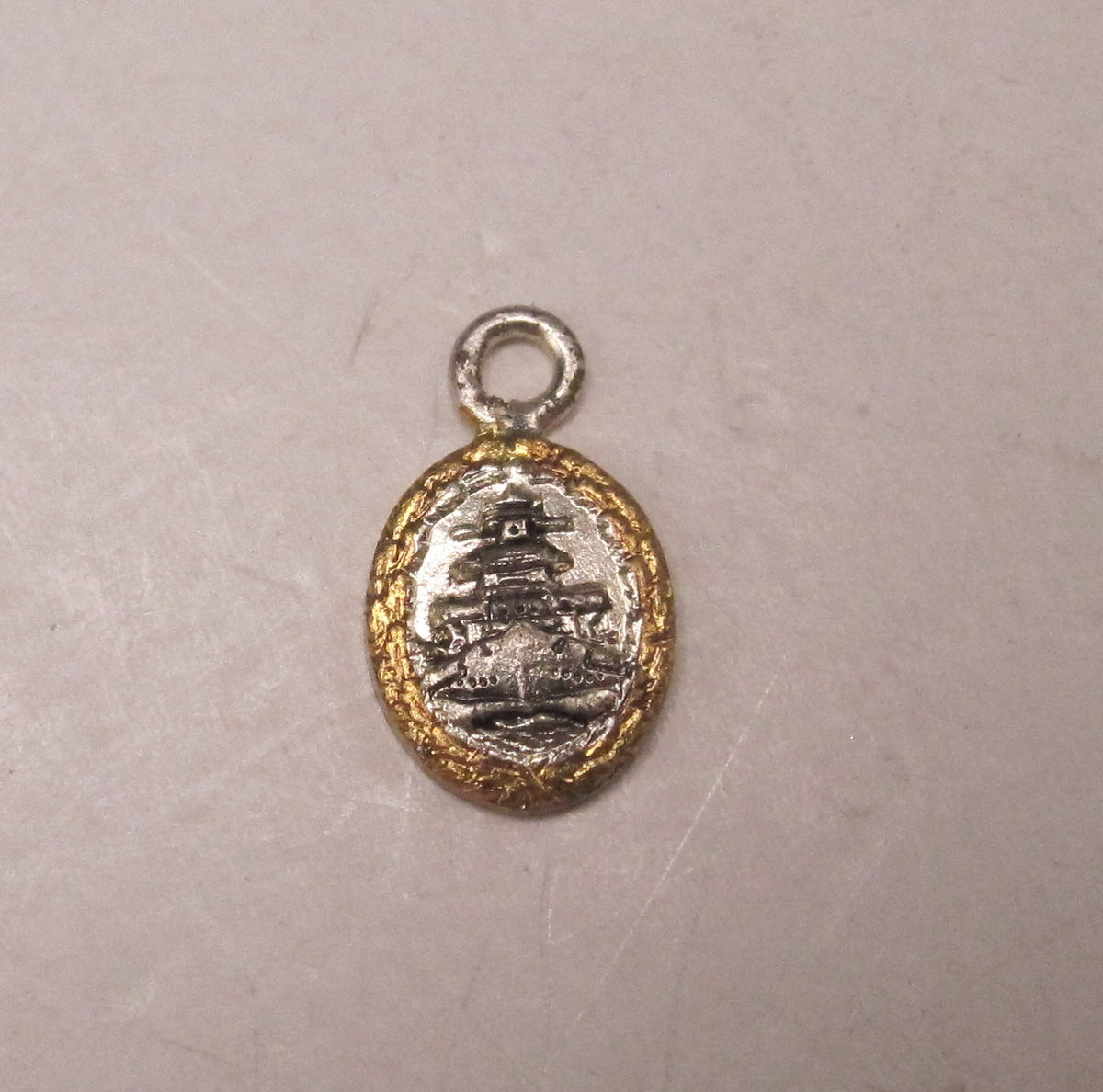 H.W.  -  - Miniatur Flottenkriegsabzeichen der Kriegsmarine Modell / Ausführung 1957