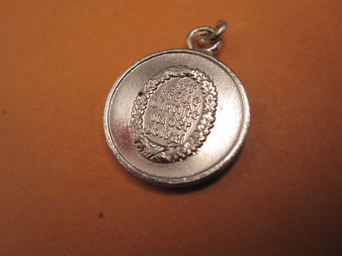 H.W.  -  - Miniatur Medaille Polizeidienstauszeichnung für 8 Jahre Modell / Ausführung 1957