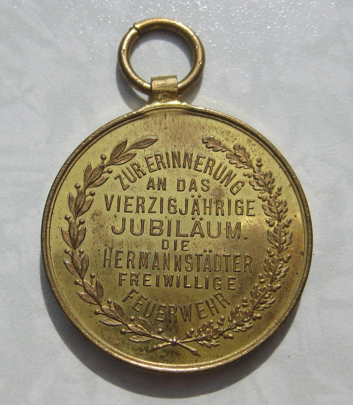 H.W. -  -  Erinnerungsabzeichen für 40 Jahre Feuerwehr HERMANNSTADT (Heute Sibiu) 1873 - 1913