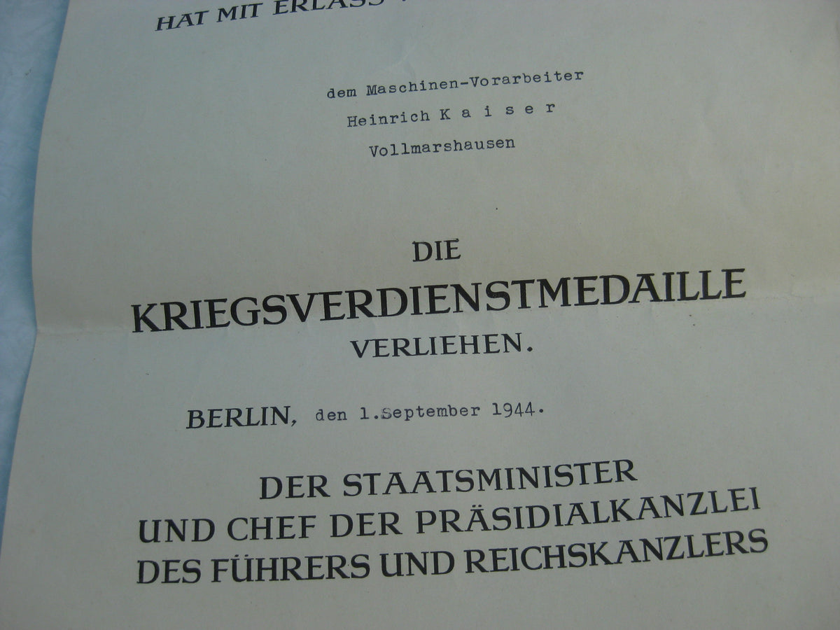 Verleihungsurkunde zur Kriegsverdienstmedaille &amp; Wehrpaß Kassel
