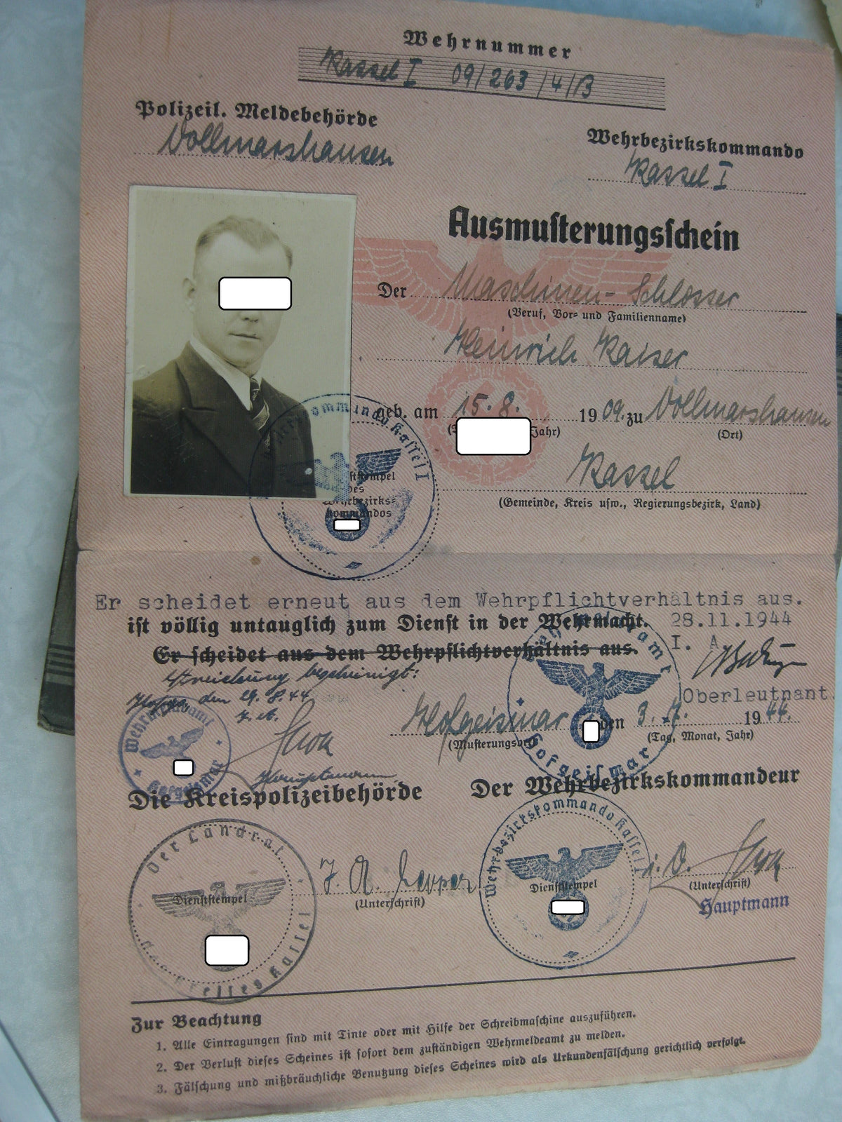 Verleihungsurkunde zur Kriegsverdienstmedaille &amp; Wehrpaß Kassel