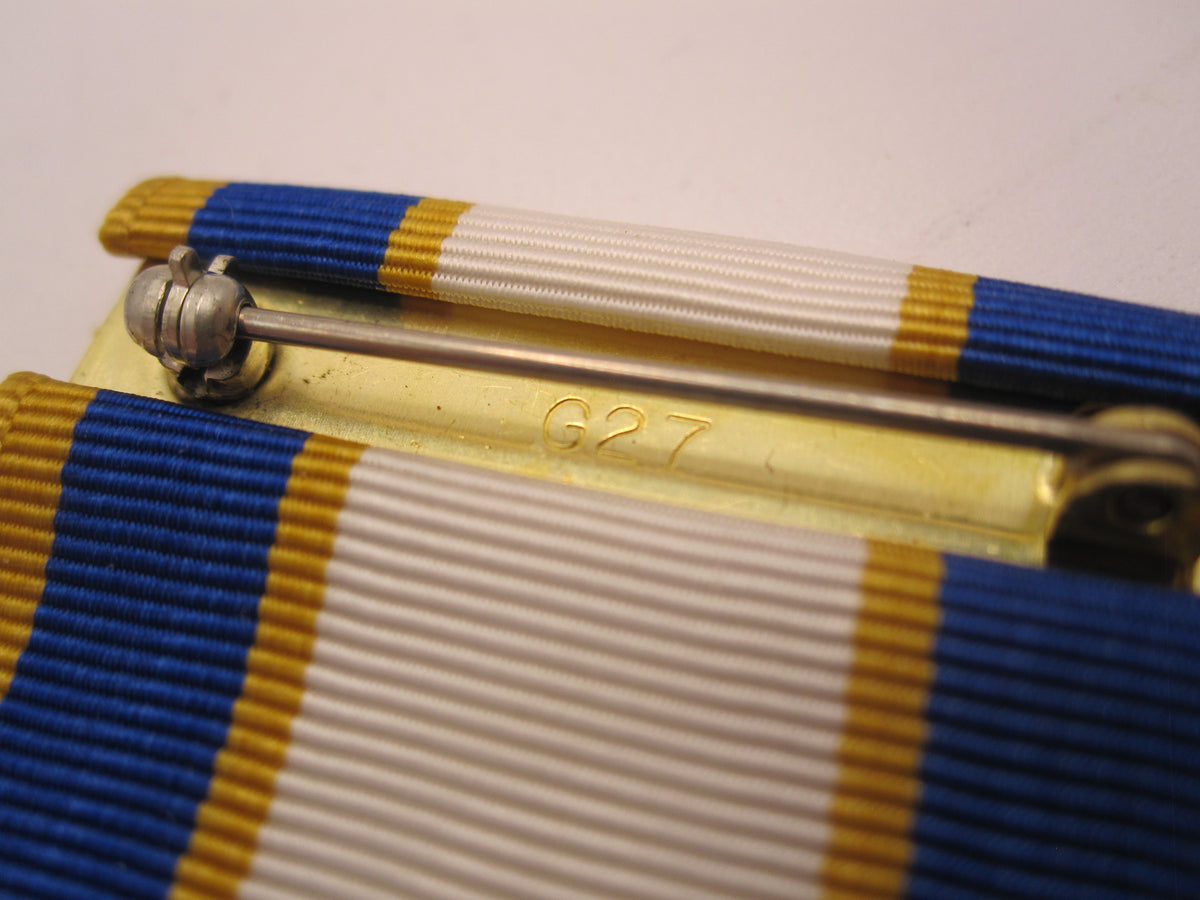 H.W.  - -  Air Force Medaille Distinguished Service Medal