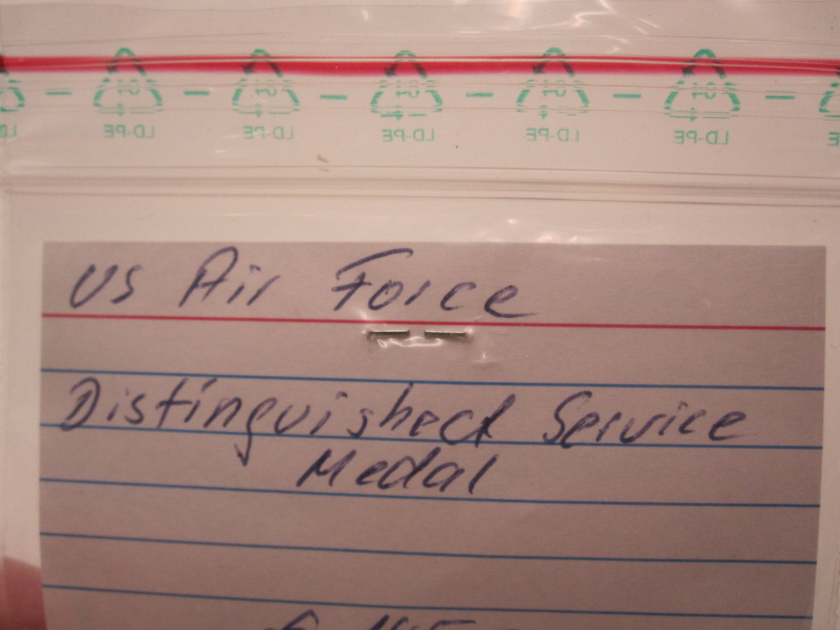 H.W.  - -  Air Force Medaille Distinguished Service Medal