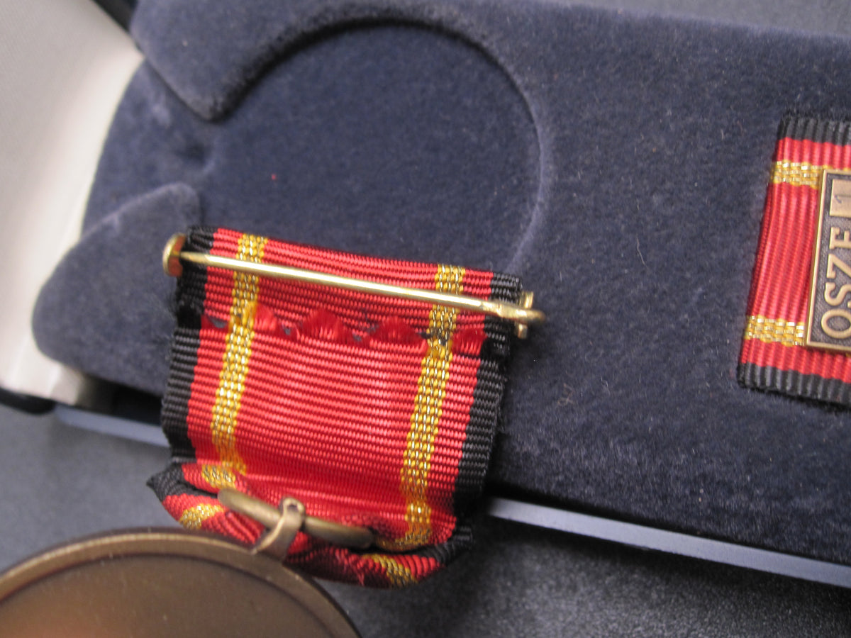 H.W.  - -   Einsatzmedaille der Bundeswehr OSZE 1 in Bronze für EINEN Einsatz