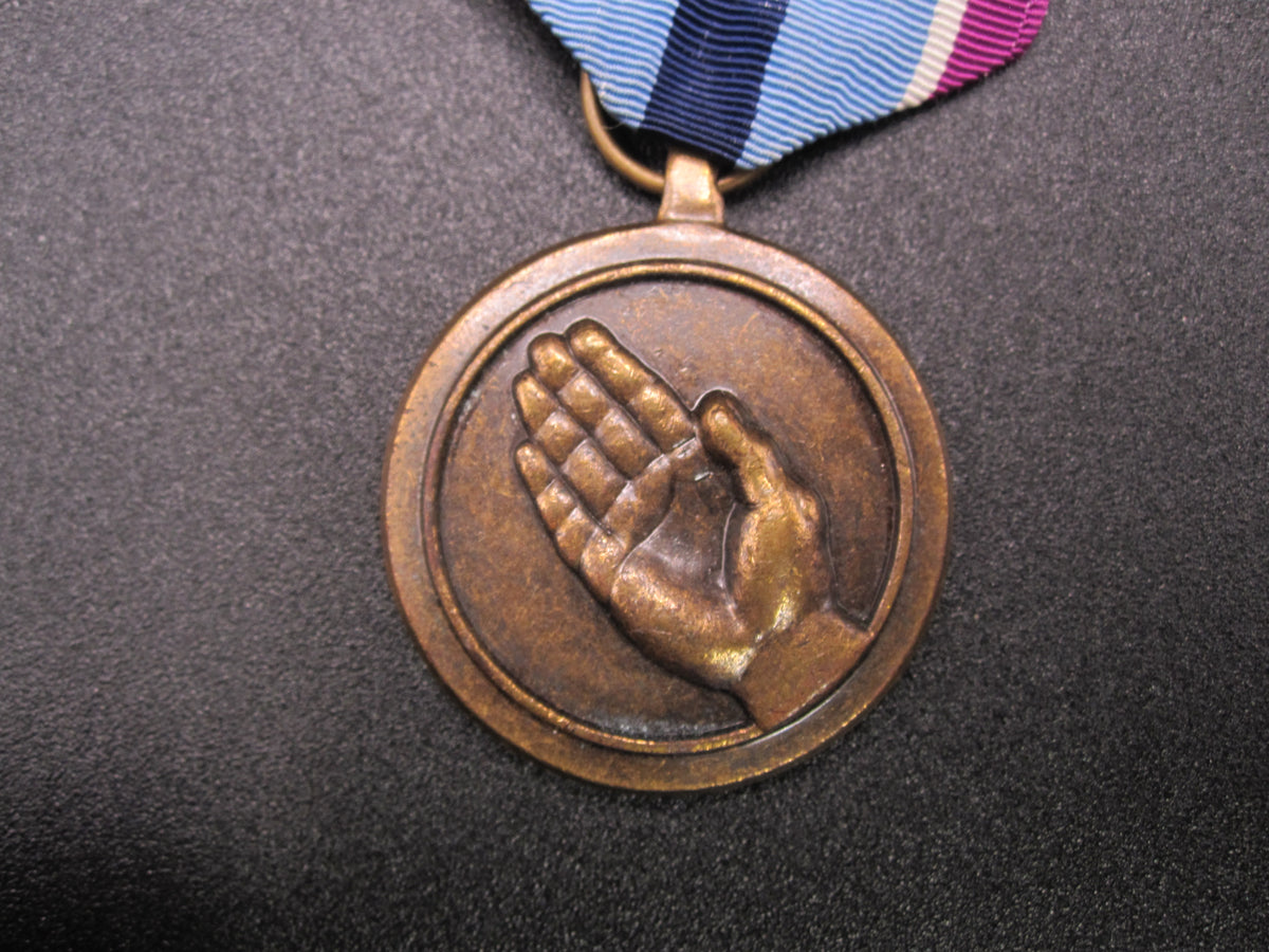 H.W.  - -  Orden USA Medaille Humanitarian Service Medal