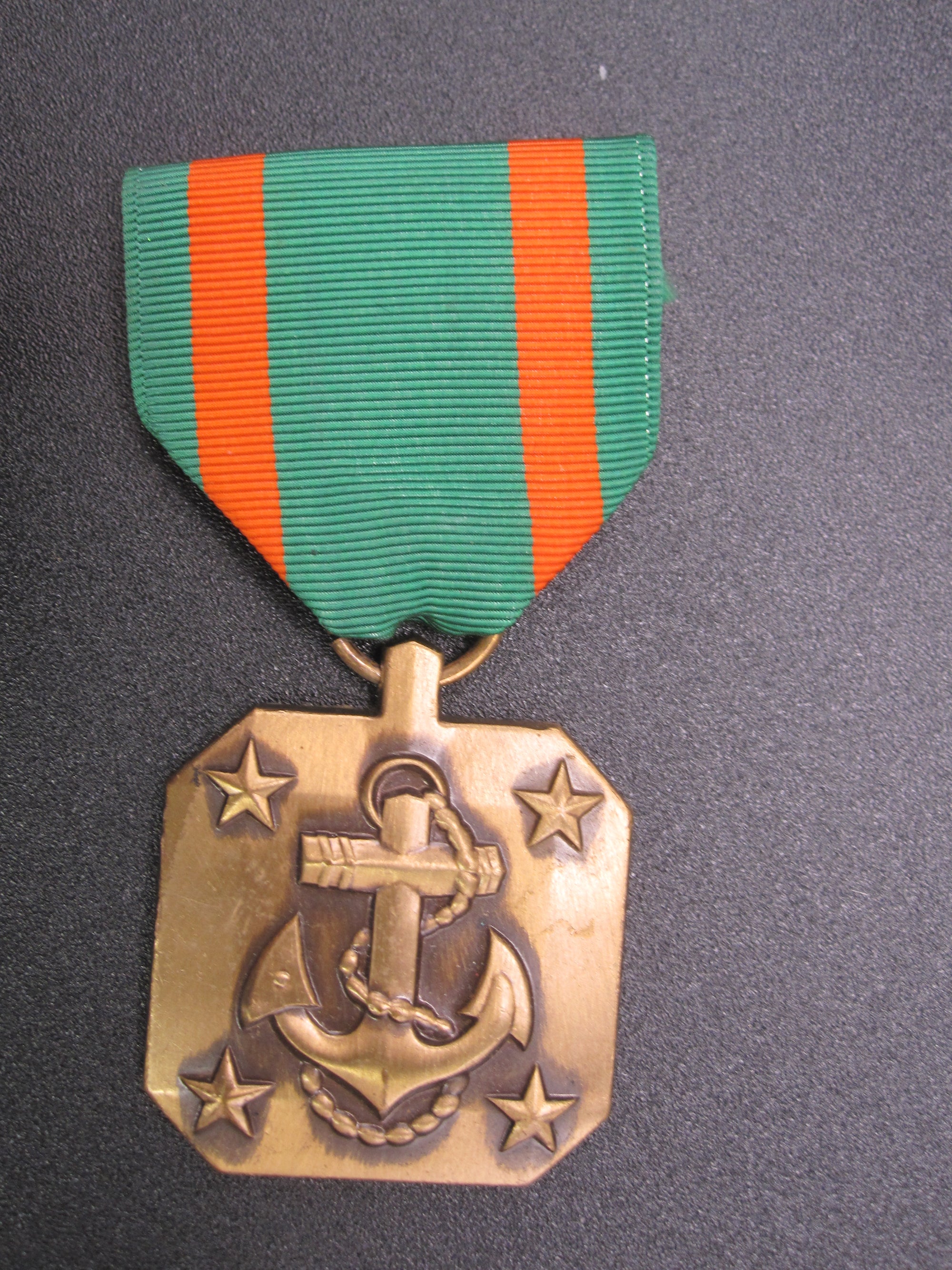 H.W.  - -   Navy and Marine Corps Achievment Medal