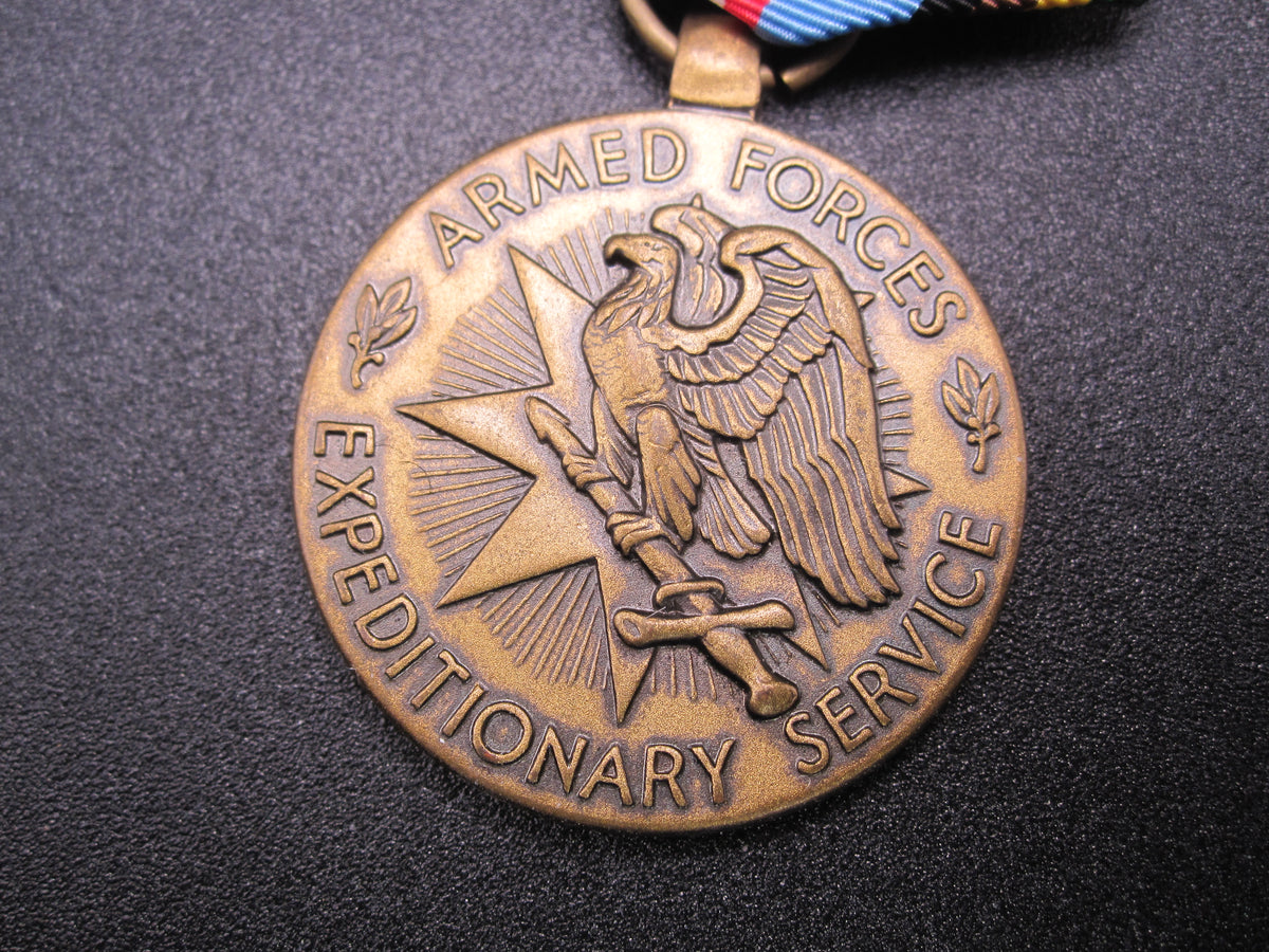 H.W.  - -   Expeditionary Medal