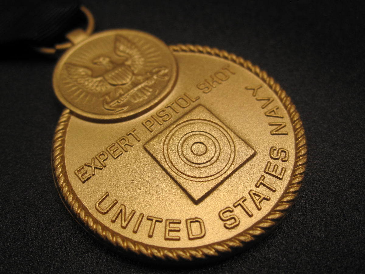 H.W.  - -   USA  Expert Pistol Medal