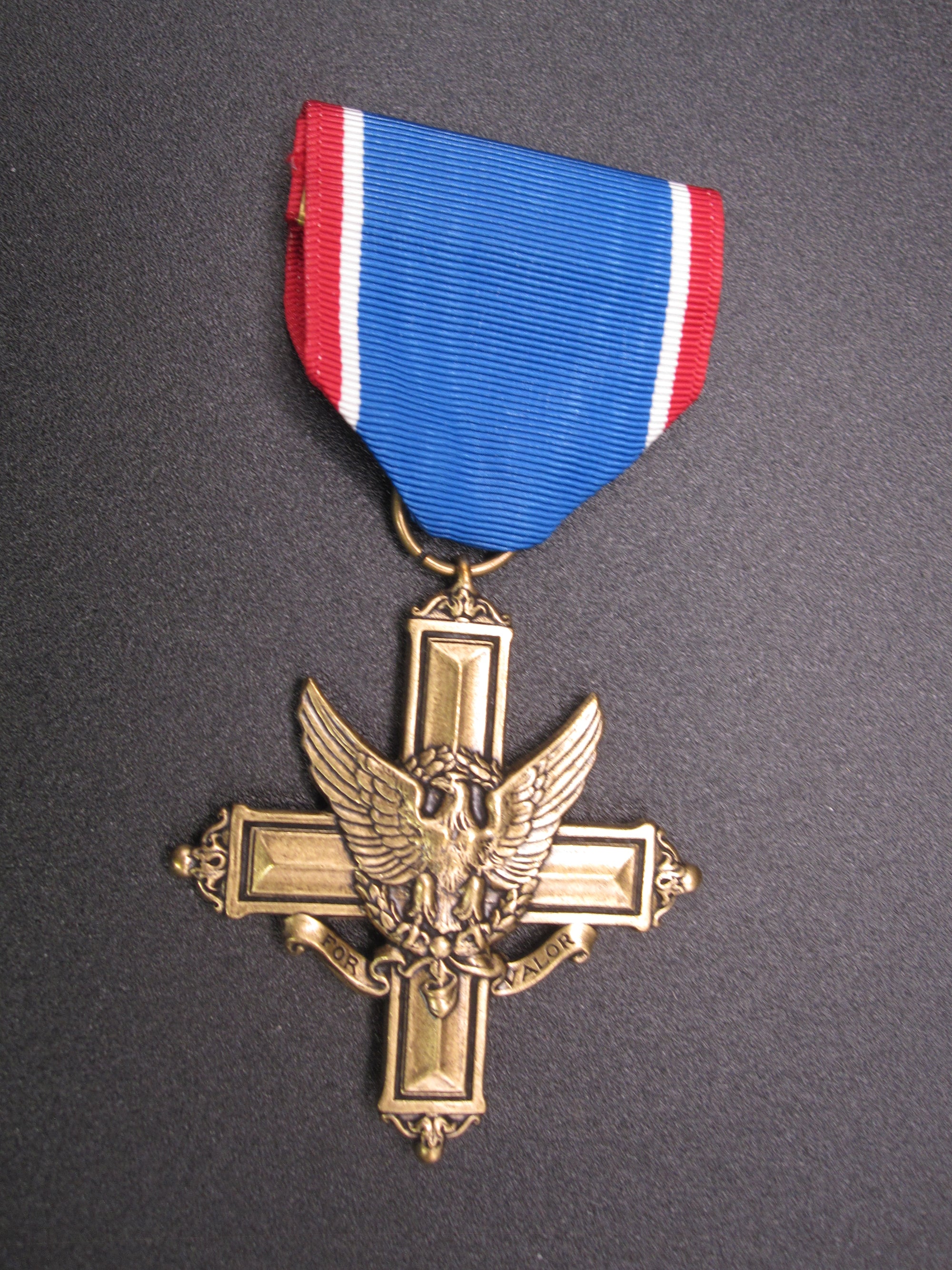 H.W.  - -   Distinguished Service Cross