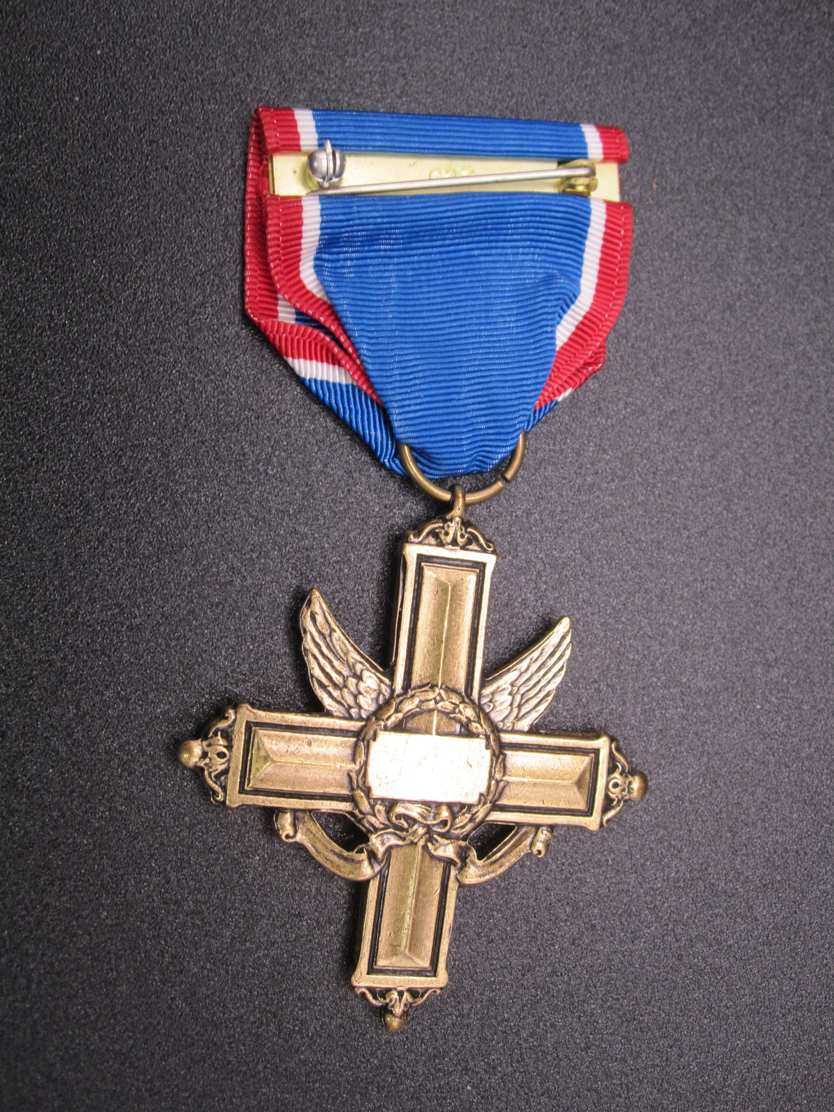 H.W.  - -   Distinguished Service Cross