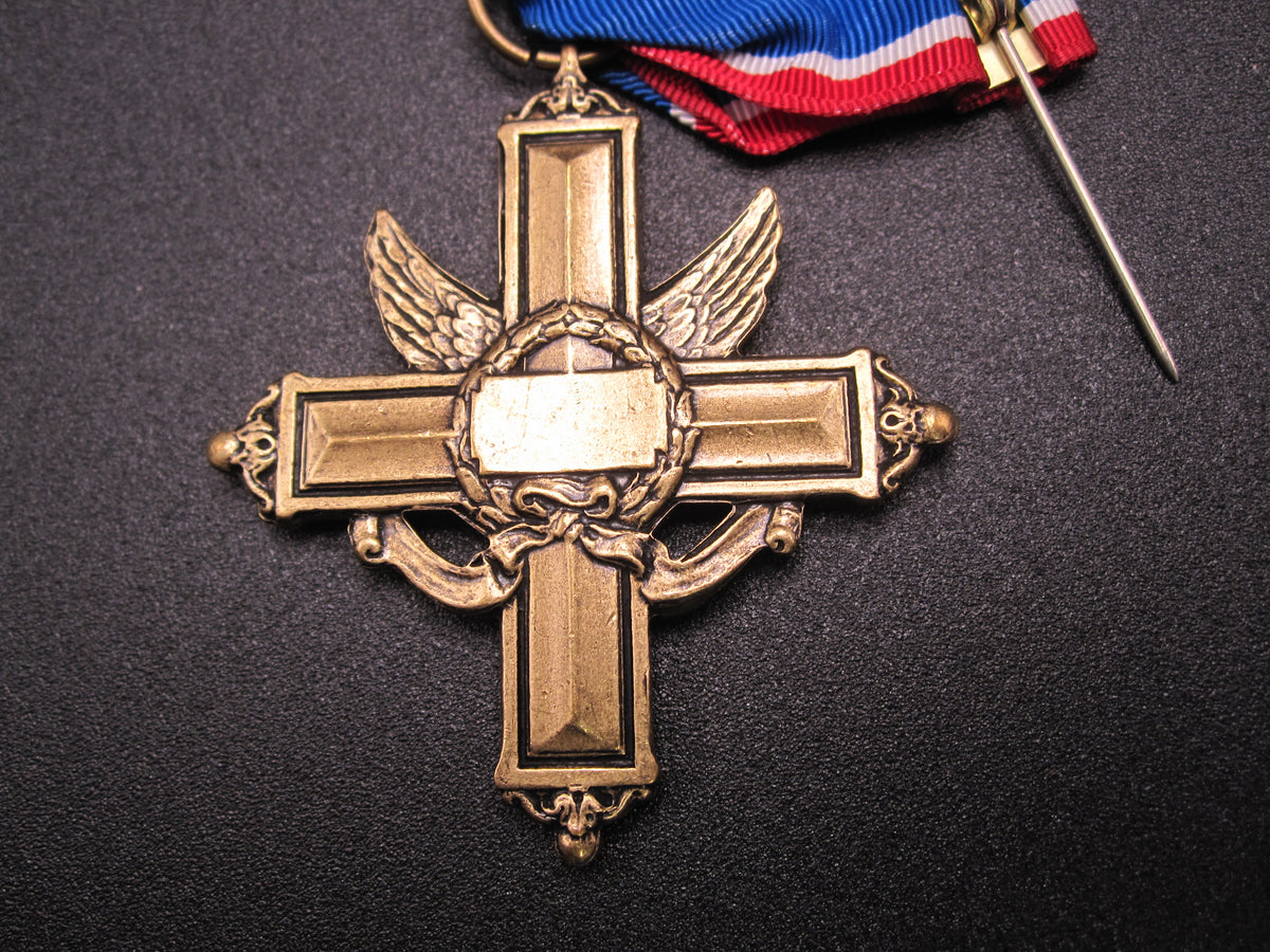 H.W.  - -   Distinguished Service Cross