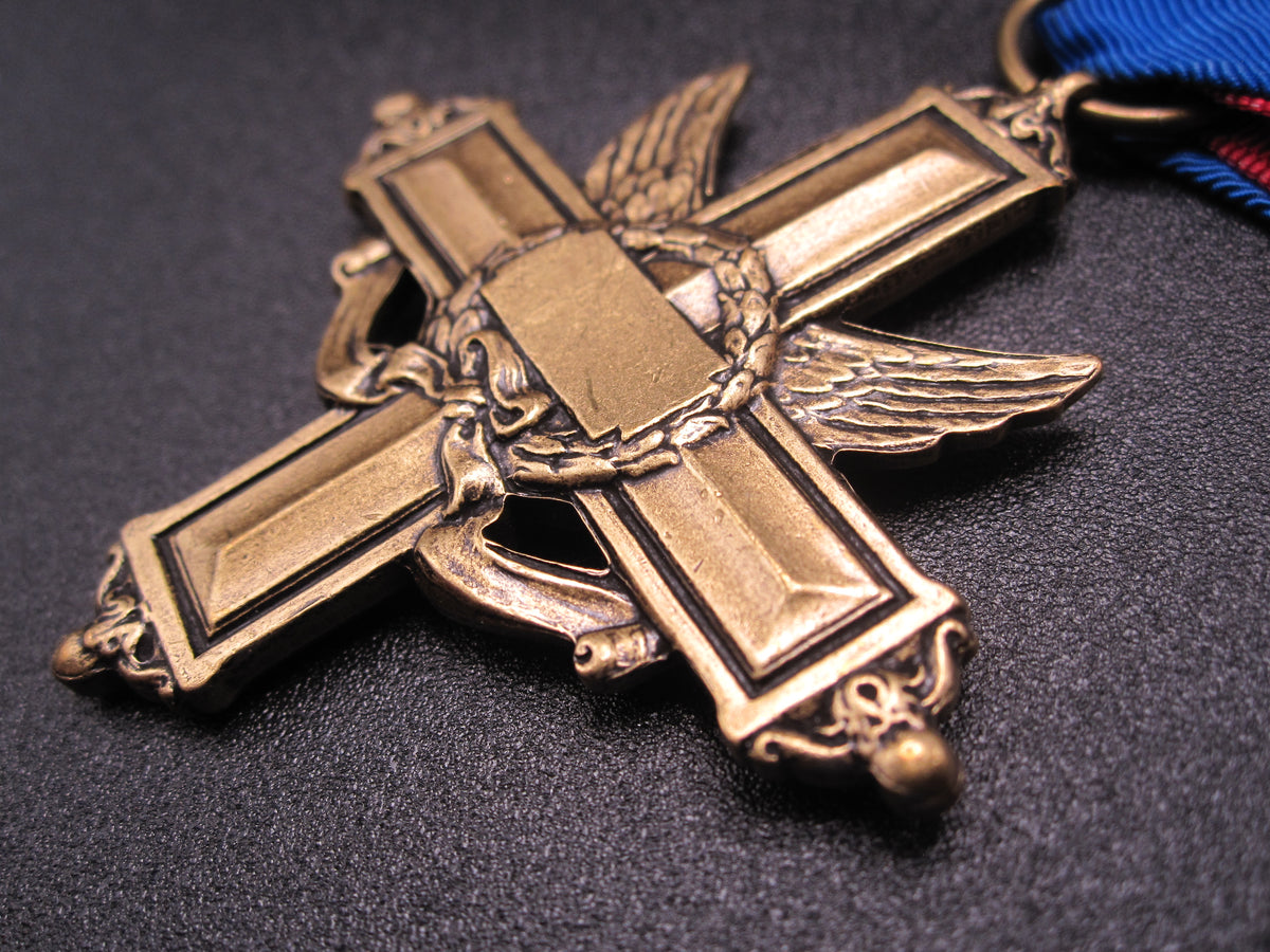 H.W.  - -   Distinguished Service Cross