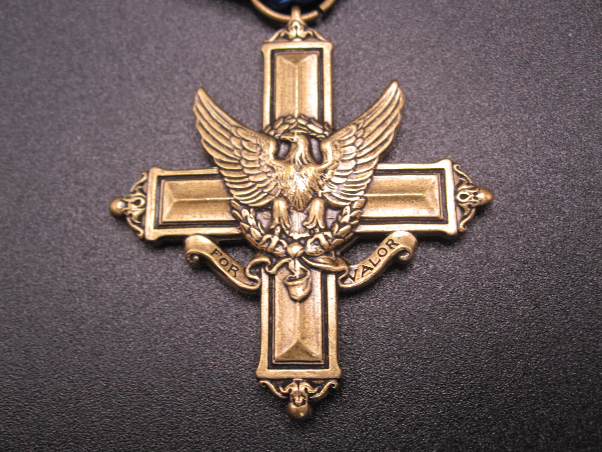 H.W.  - -   Distinguished Service Cross