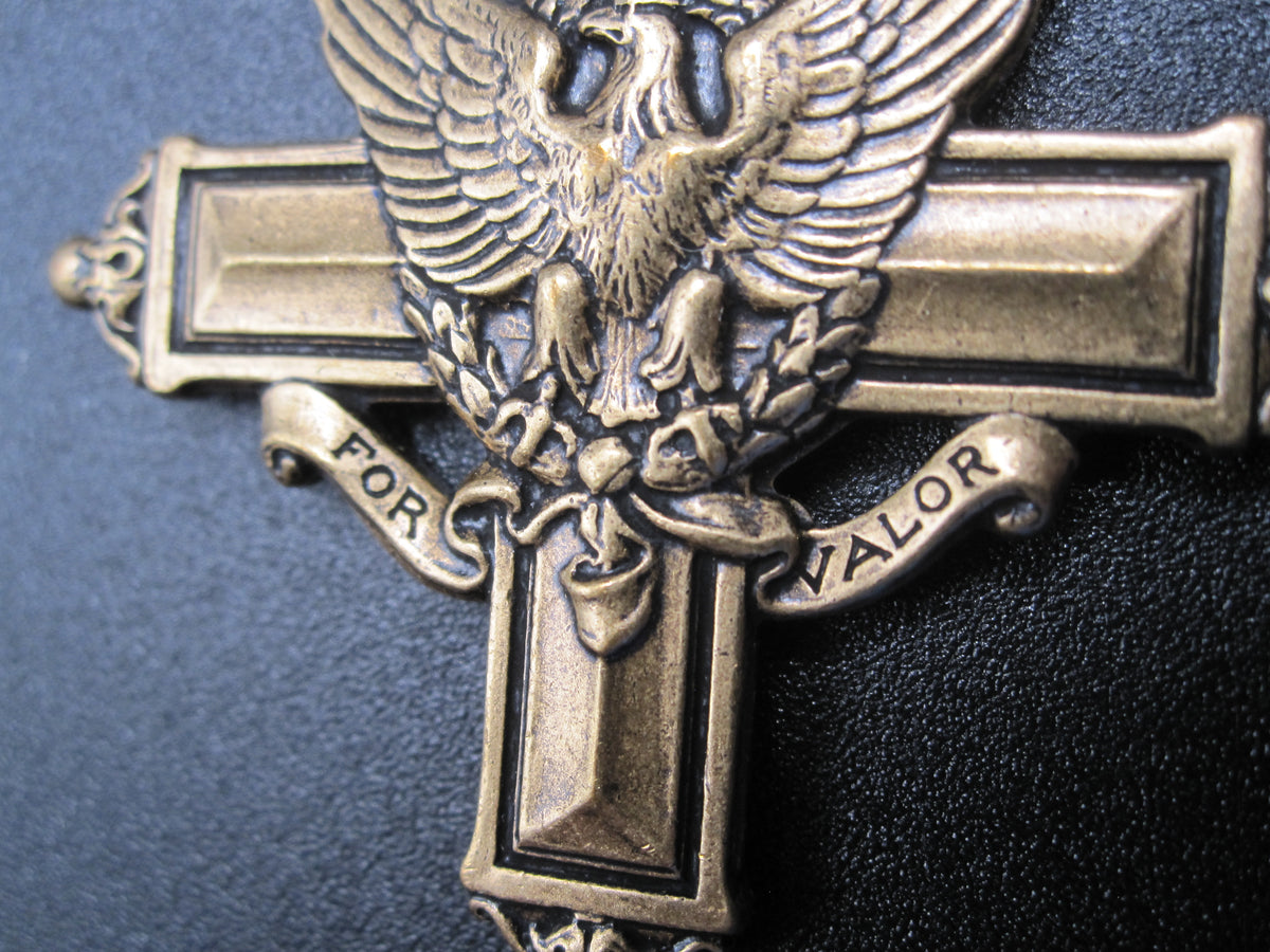 H.W.  - -   Distinguished Service Cross