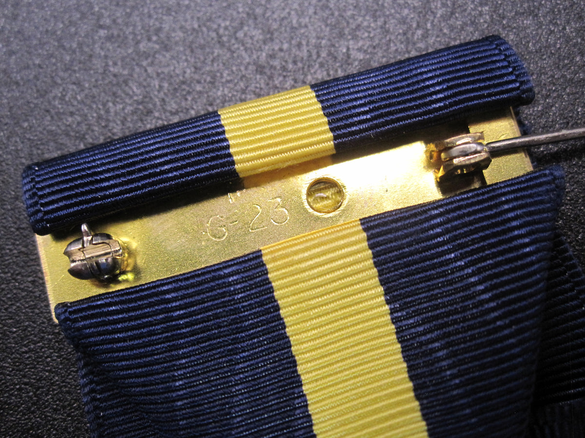 H.W.  - -   Distinguished Service Medal  NAVY