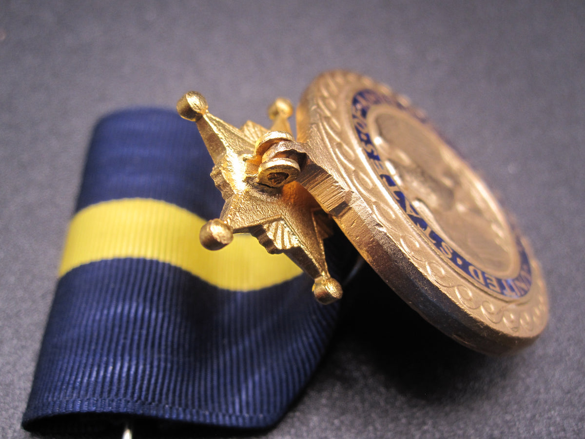 H.W.  - -   Distinguished Service Medal  NAVY