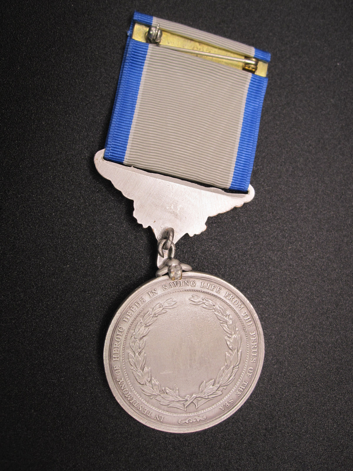 H.W.  - -   Lifesaving Medal in Silver
