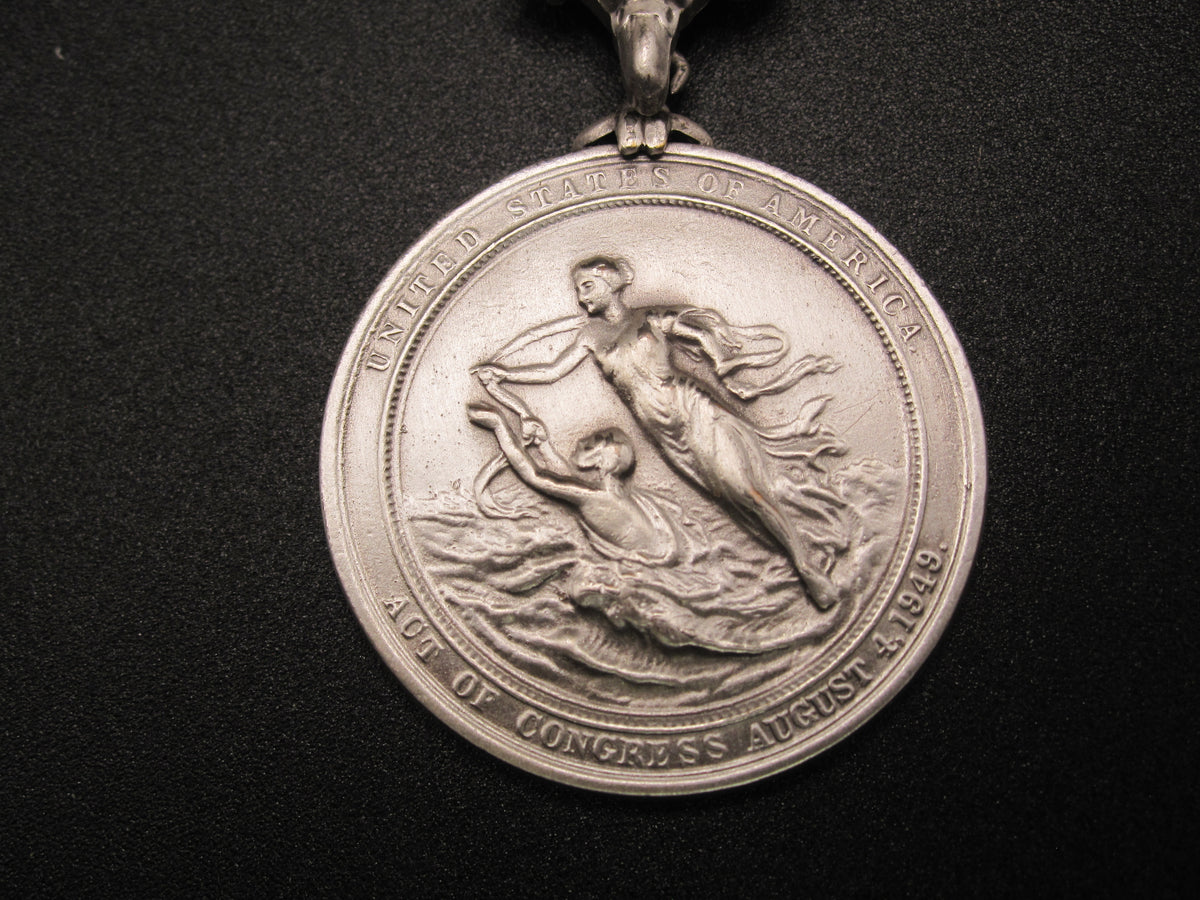 H.W.  - -   Lifesaving Medal in Silver