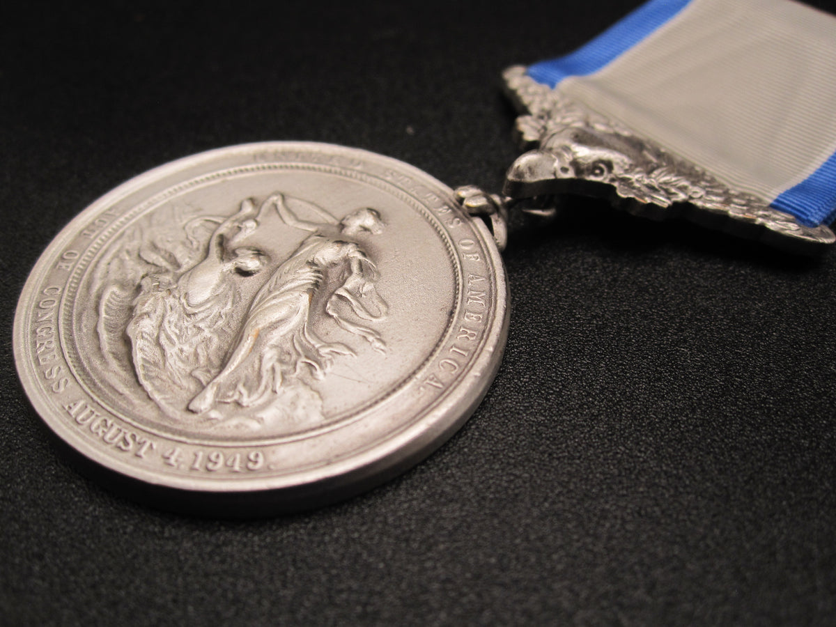 H.W.  - -   Lifesaving Medal in Silver