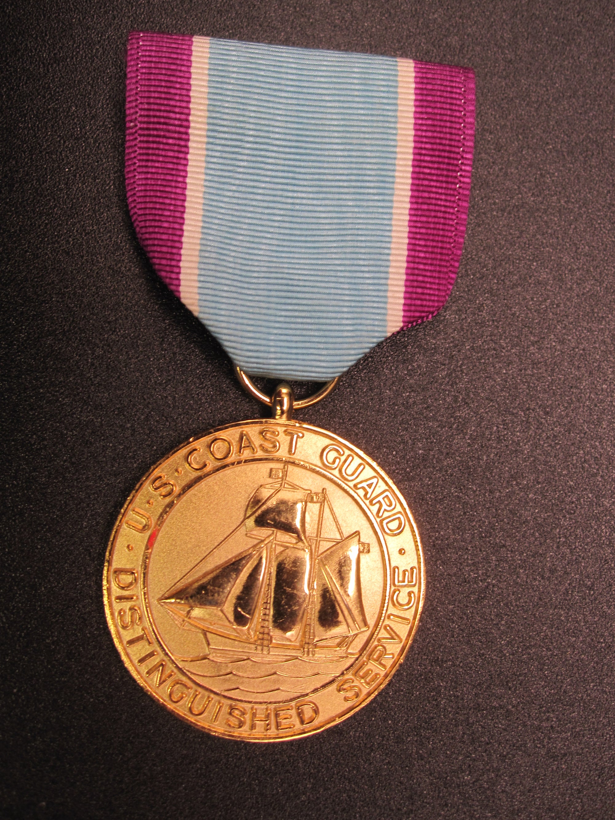 H.W.  - -   Distinguished Service Medal