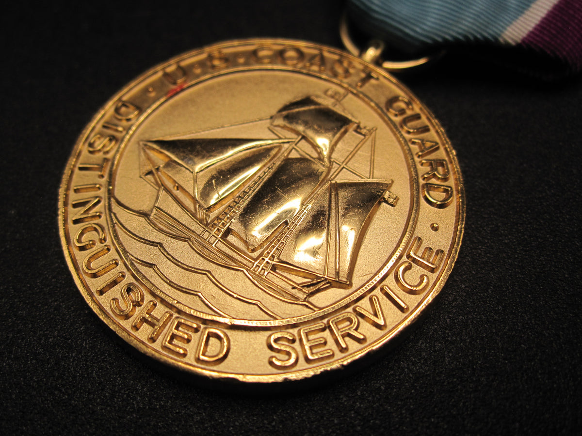 H.W.  - -   Distinguished Service Medal