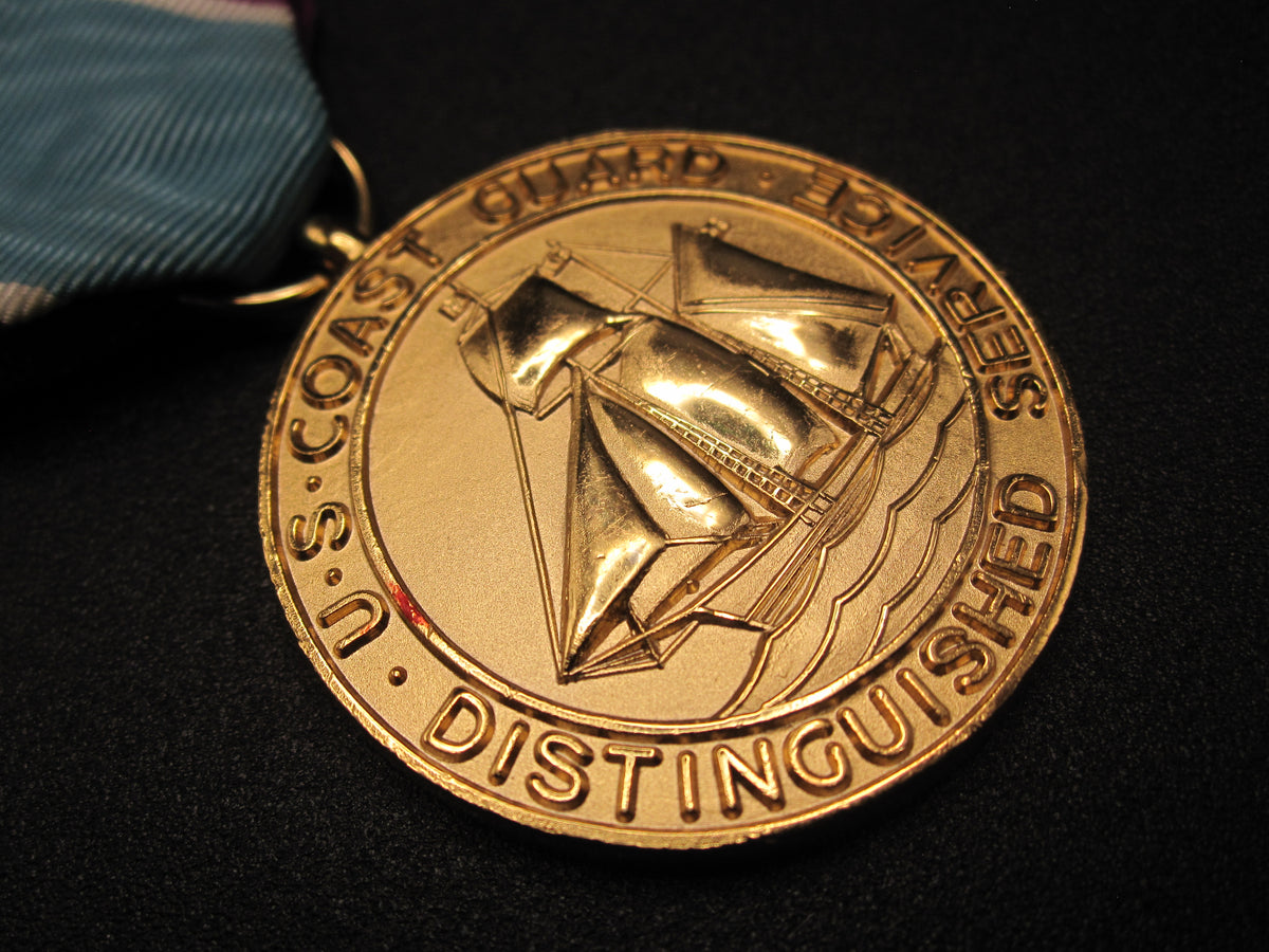 H.W.  - -   Distinguished Service Medal