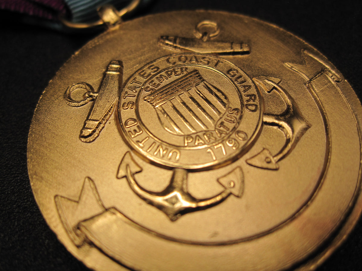 H.W.  - -   Distinguished Service Medal