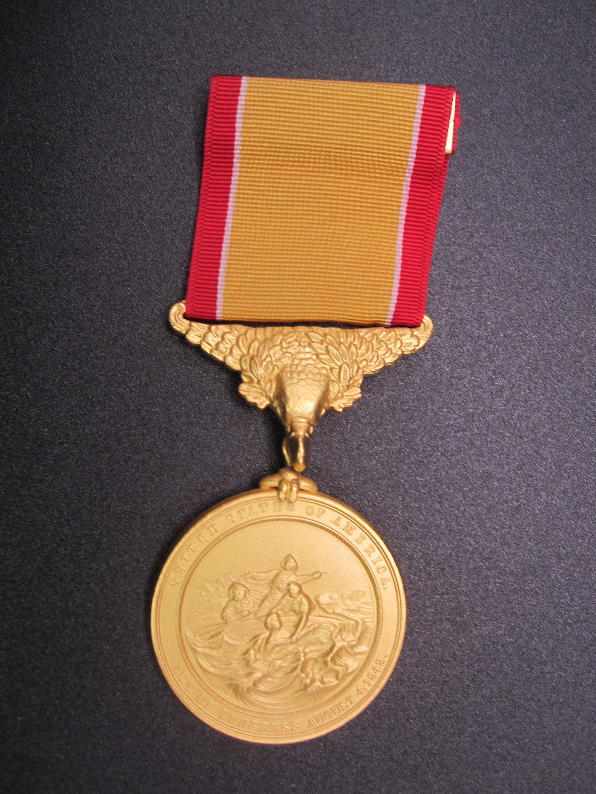 H.W.  - -   Lifesaving Medal in Gilt / Gold