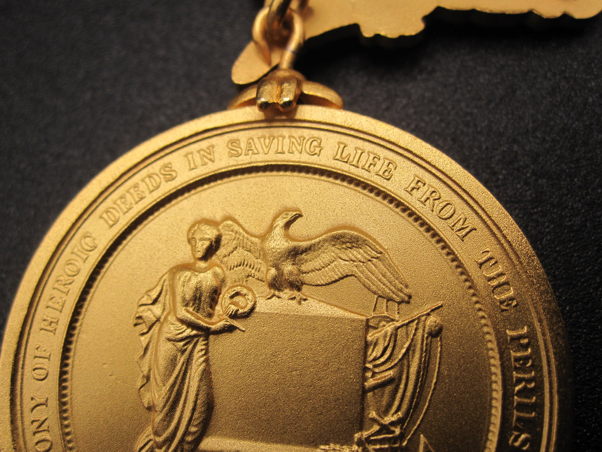 H.W.  - -   Lifesaving Medal in Gilt / Gold